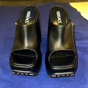 Versace leather platforms.